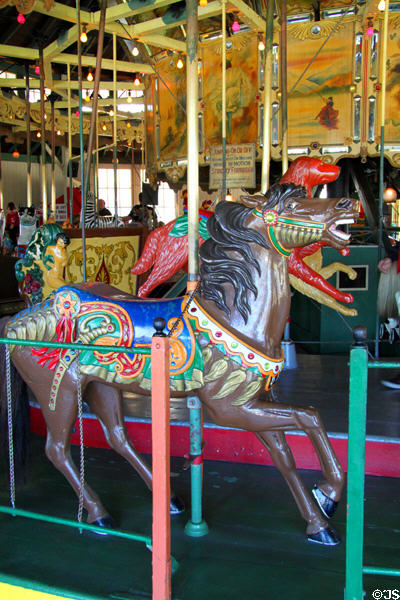 Carved horse with Arabian motif on Balboa Park Carousel. San Diego, CA.