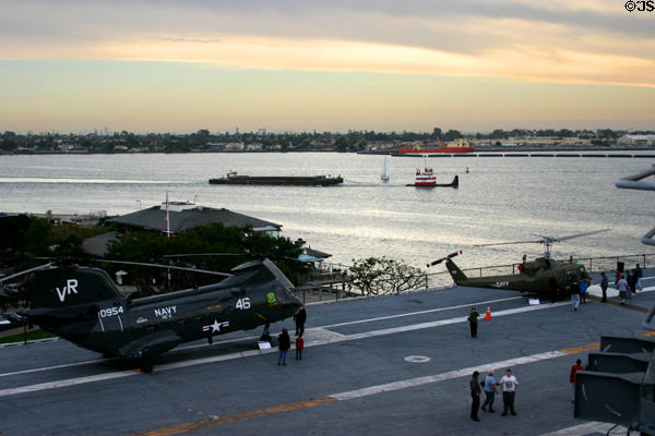 View of helicopters & harbor traffic from bridge of Midway aircraft carrier. San Diego, CA.