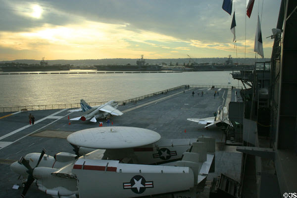 View of deck & other carriers from bridge of Midway aircraft carrier. San Diego, CA.