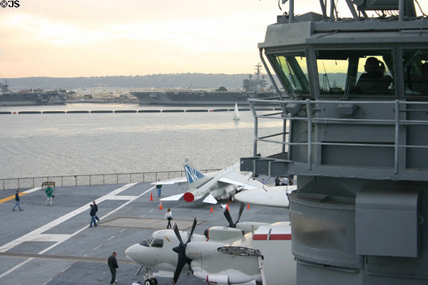 View of flight control center & other carriers from bridge of Midway aircraft carrier. San Diego, CA.