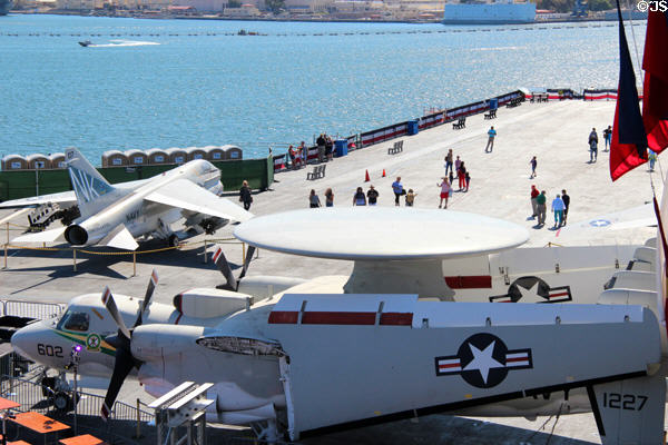 A-7 Corsair II bomber & E-2 Hawkeye radar platform on deck of Midway aircraft carrier. San Diego, CA.