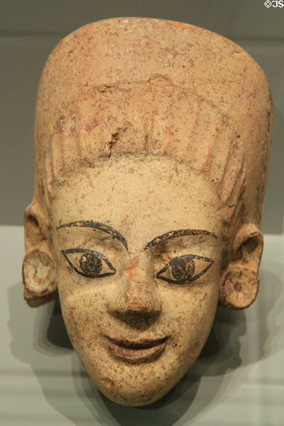 Etruscan terracotta antefix roof ornament with female head (525-500 BCE) from Caere at Getty Museum Villa. Malibu, CA.