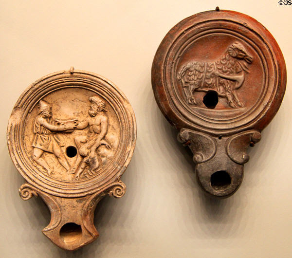 Roman terracotta oil lamps with themes of Ulysses (1-100 CE) at Getty Museum Villa. Malibu, CA.