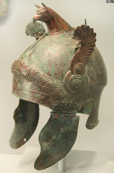 Greek bronze ceremonial helmet with griffon crown (350-300 BCE) from South Italy at Getty Museum Villa. Malibu, CA.
