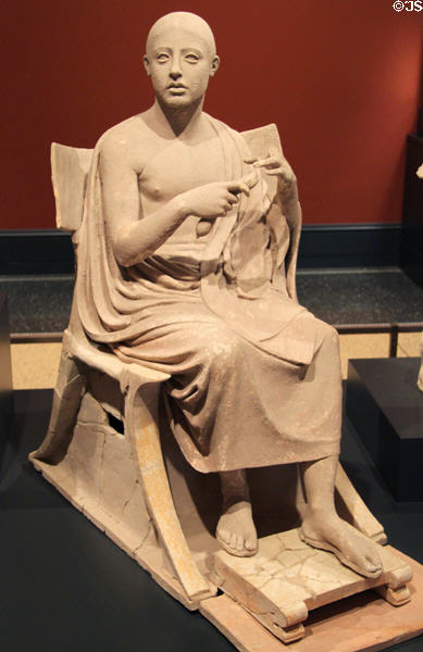 Greek terracotta statue of Poet as Orpheus (350-300 BCE) from Taras, South Italy at Getty Museum Villa. Malibu, CA.