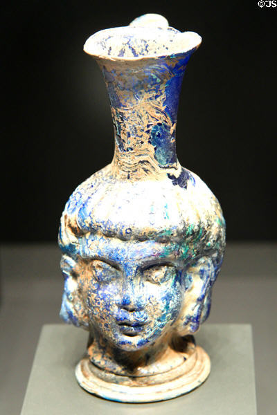 Roman mold-blown glass head-shaped flask (300-500 CE) at Getty Museum Villa. Malibu, CA.