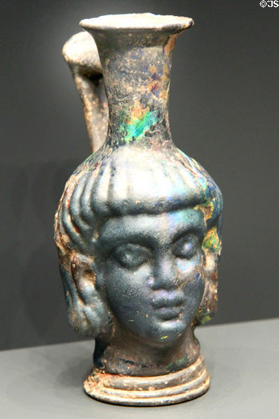 Roman mold-blown glass head-shaped flask (300-500 CE) at Getty Museum Villa. Malibu, CA.