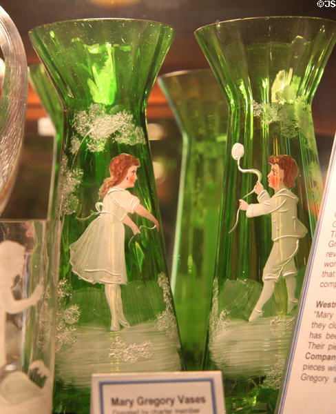 Green Mary Gregory glass vases at Historical Glass Museum. Redlands, CA.