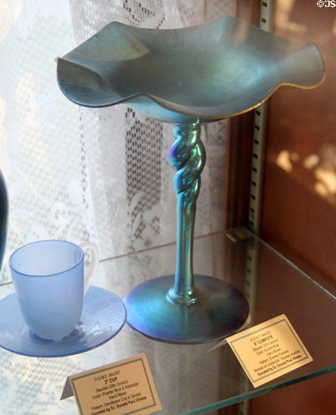 Powder blue demitasse cup & aurene blue compote both (20thC) by Steuben Glass Co. at Historical Glass Museum. Redlands, CA.