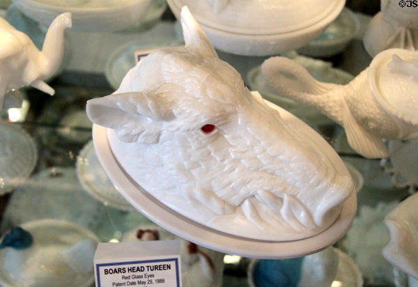 Glass tureen in shape of boats head with red eyes (1888) at Historical Glass Museum. Redlands, CA.