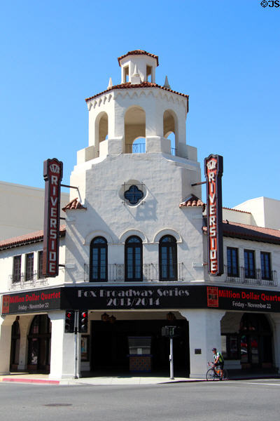 Octagonal tower of Riverside Fox Theater with neon signs. Riverside, CA.