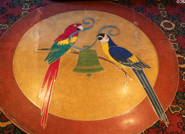 Floor design of two parrots holding mission bell at Mission Inn. Riverside, CA.