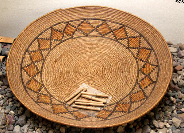 Luiseño basket bowl (pre 1900) with gambling sticks at Riverside Museum. Riverside, CA.