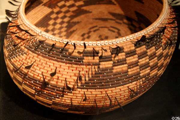 California native basket bowl (late 1890s) with quail feathers at Riverside Museum. Riverside, CA.