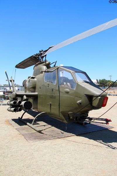 Bell AH-1 Cobra helicopter gunship in Vietnam-era replica Fire Base Romeo Charlie at March Field Air Museum. Riverside, CA.