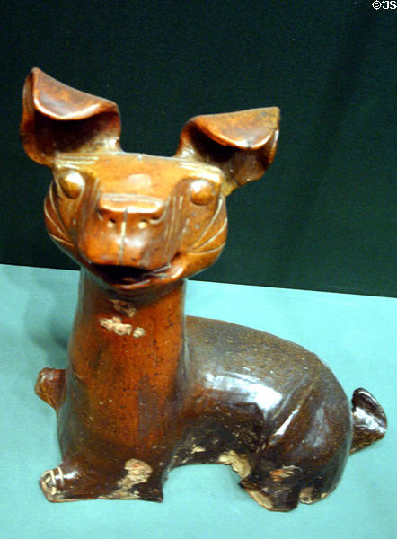 China: Eastern Han dynasty earthenware dog (25-220) in Asian Art Museum. San Francisco, CA.