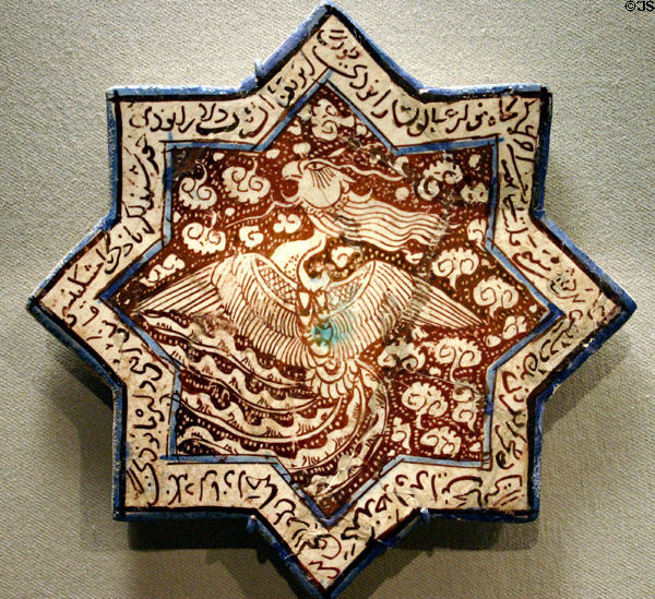 Earthenware fritware star-shaped tile with phoenix (1292-3) from Iran at Asian Art Museum. San Francisco, CA.