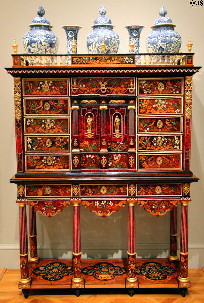 Inlaid cabinet on stand c1665 by Pierre Gole of Paris, France supporting five Japanese vases (late 17th C) at Legion of Honor Museum. San Francisco, CA.