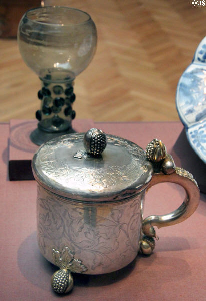 Silver tankard c1650 by Abraham Meytens of Stockholm before Dutch goblet (17th C) at Legion of Honor Museum. San Francisco, CA.