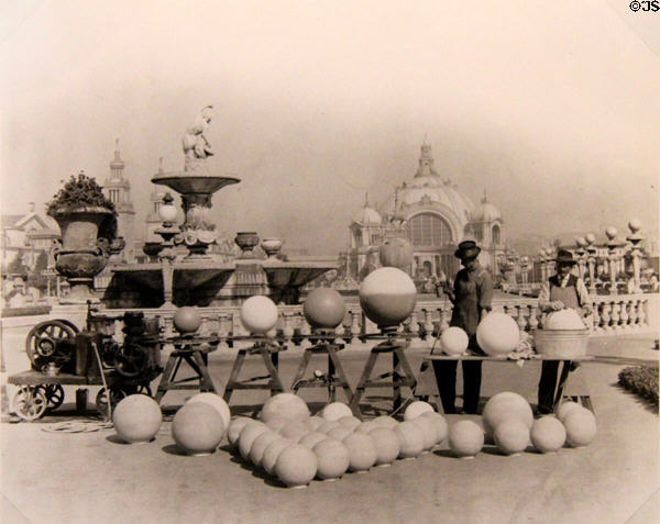 Print shows workers coloring light globes in pastel colors for light show of Panama-Pacific International Exposition (1915) in private collection. San Francisco, CA.