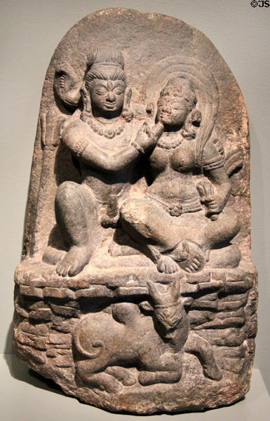 Hindu deity Shiva with goddess Parvati sculpture (600-700) from Bihar, India at Asian Art Museum. San Francisco, CA.