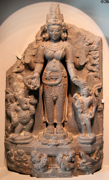Hindu deity Parvati with her sons Ganesha & Skanda sculpture (1000-1100) from Eastern Bangladesh at Asian Art Museum. San Francisco, CA.