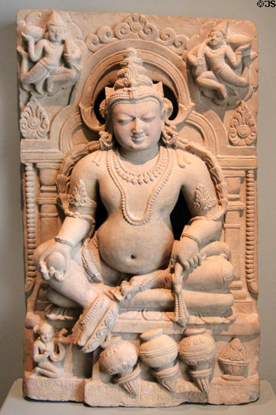 Hindu deity Jambhala sculpture (1000-1100) from Bihar, India at Asian Art Museum. San Francisco, CA.
