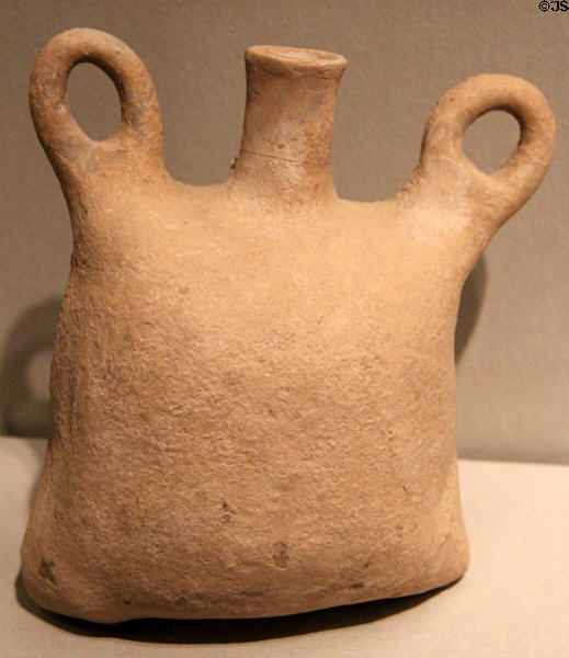 Earthenware two-handled vessel in shape of water skin (1000-800 BCE) from Northern Iran at Asian Art Museum. San Francisco, CA.