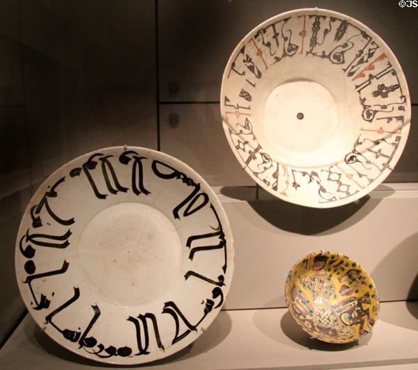 Two earthenware bowls with Arabic inscription (800-1000) from Eastern Iran or Uzbekistan & bowl with horse & rider (c1000) from Eastern Iran at Asian Art Museum. San Francisco, CA.