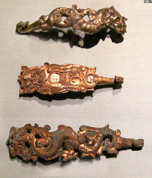 Gilt bronze belt hooks (c475 BCE-9 CE) from China at Asian Art Museum. San Francisco, CA.