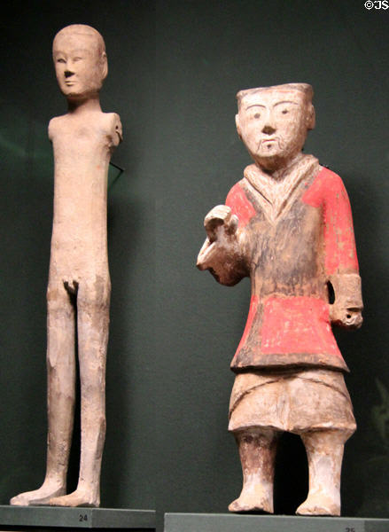 Ceramic male & warrior figures (c206 BCE-9 CE) from China at Asian Art Museum. San Francisco, CA.
