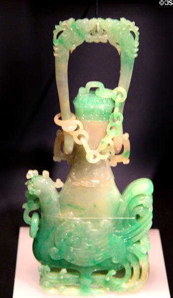 Carved jadeite mythical bird presenting a vessel (1900-49) from China at Asian Art Museum. San Francisco, CA.
