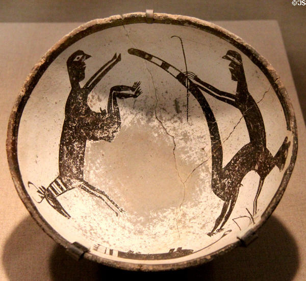 Mimbres native pottery bowl (c1010-1130) with composite figures from southern New Mexico at de Young Museum. San Francisco, CA.