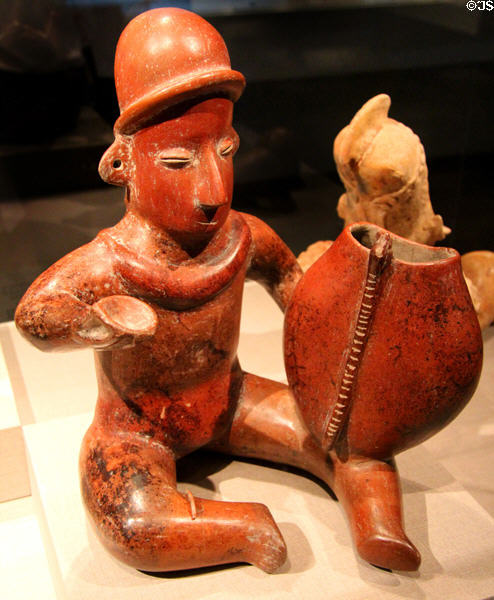 Colima earthenware musician with gourd (300 BCE-300 CE) from West Mexico at de Young Museum. San Francisco, CA.