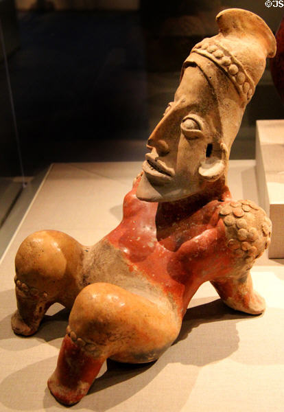 Jalisco earthenware acrobat figure (300 BCE-300 CE) from West Mexico at de Young Museum. San Francisco, CA.