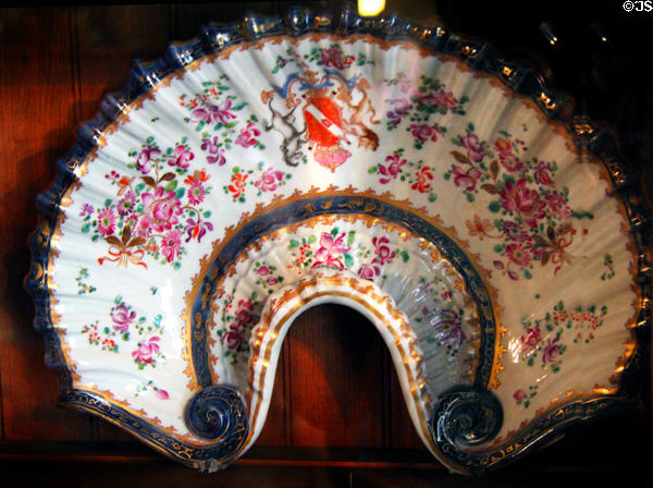 Porcelain scalloped plate with coat of arms at Haas-Lilienthal House. San Francisco, CA.