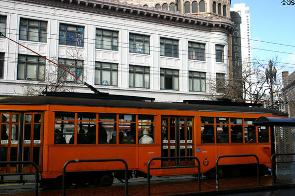Part of city's streetcar collection on Market Street still with original Italian colors & markings. San Francisco, CA.