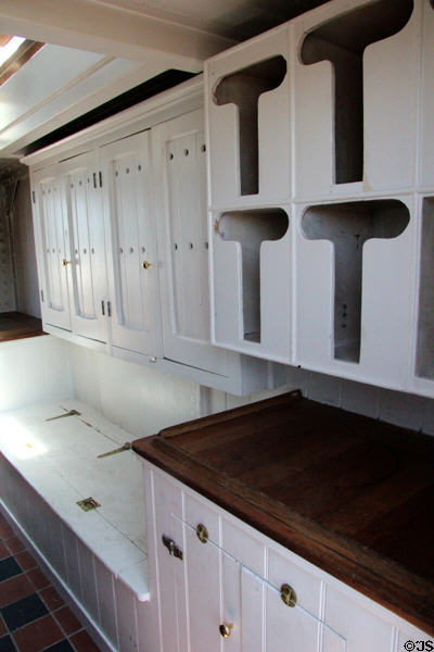 Mess cupboards for dishes & stores aboard sailing ship Balclutha at Maritime National Historical Park. San Francisco, CA.