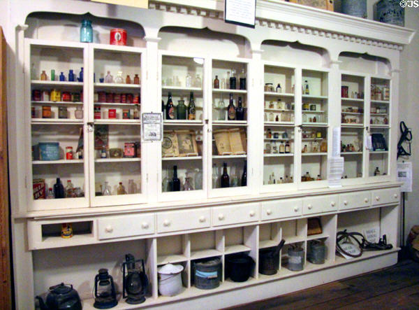 Antique pharmacy shelves & artifacts at Northern Mariposa County Museum. Coulterville, CA.