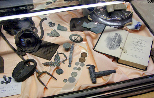 "Families on The Trail" display shows items brought west at Tuolumne County Museum. Sonora, CA.
