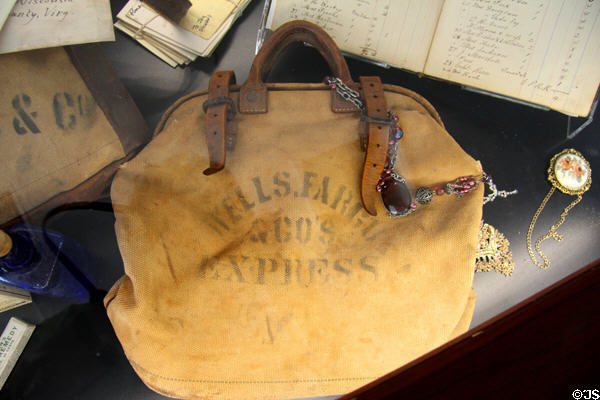 Valise-style shipping bag with Well Fargo & Co's Express logo in Quartz Mountain Stage Line office at Columbia State Historic Park. Columbia, CA.