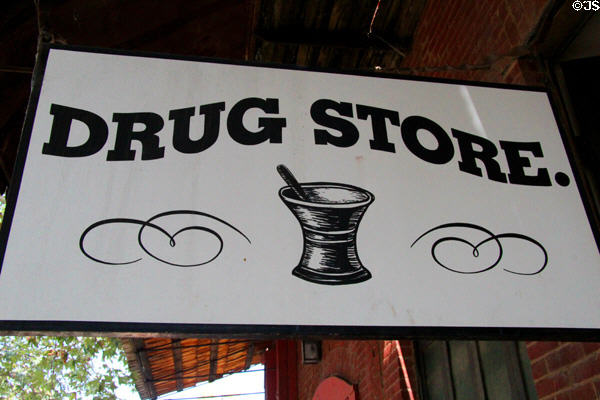 Traditional drug store sign on building at Columbia State Historic Park. Columbia, CA.