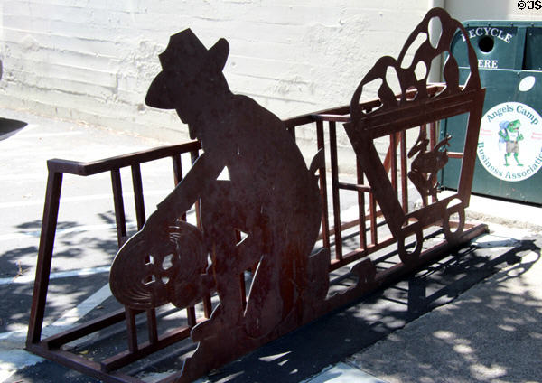 Scupture showing miner & frog on mining cart. Angels Camp, CA.