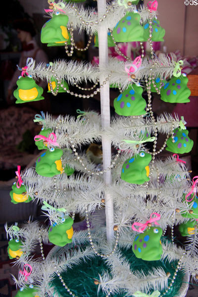 Christmas tree decorated with frog ornaments. Angels Camp, CA.