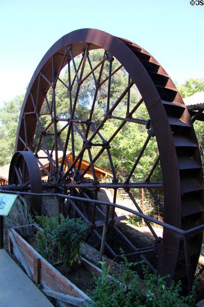 Water wheel (c1902) installed by Angels Mining Co. to operate a stamp mill at Angels Camp Museum. Angels Camp, CA.