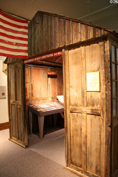 Display of California's oldest court house (1850) constructed of pre-cut Camphor wood, originally located in Double Springs, then County Seat of Calaveras County at Calaveras County Downtown Museum. San Andreas, CA.