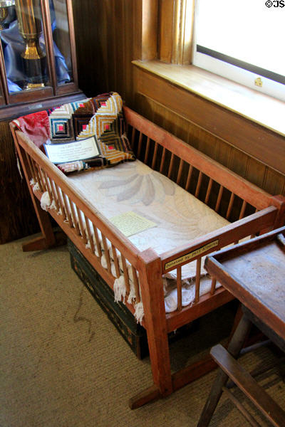 Young child's rocking crib (c1901) at Calaveras County Downtown Museum. San Andreas, CA.