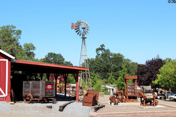 Antique machinery & windmill at Red Barn Museum. San Andreas, CA.