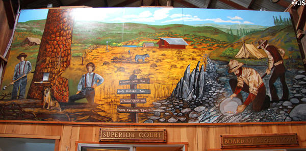 Mural depicting farming, lumbering & panning for gold in Calaveras County at Red Barn Museum. San Andreas, CA.