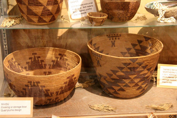 Maidu cooking or storage basket bowl with quail plume design at El Dorado County Historical Museum. Placerville, CA.